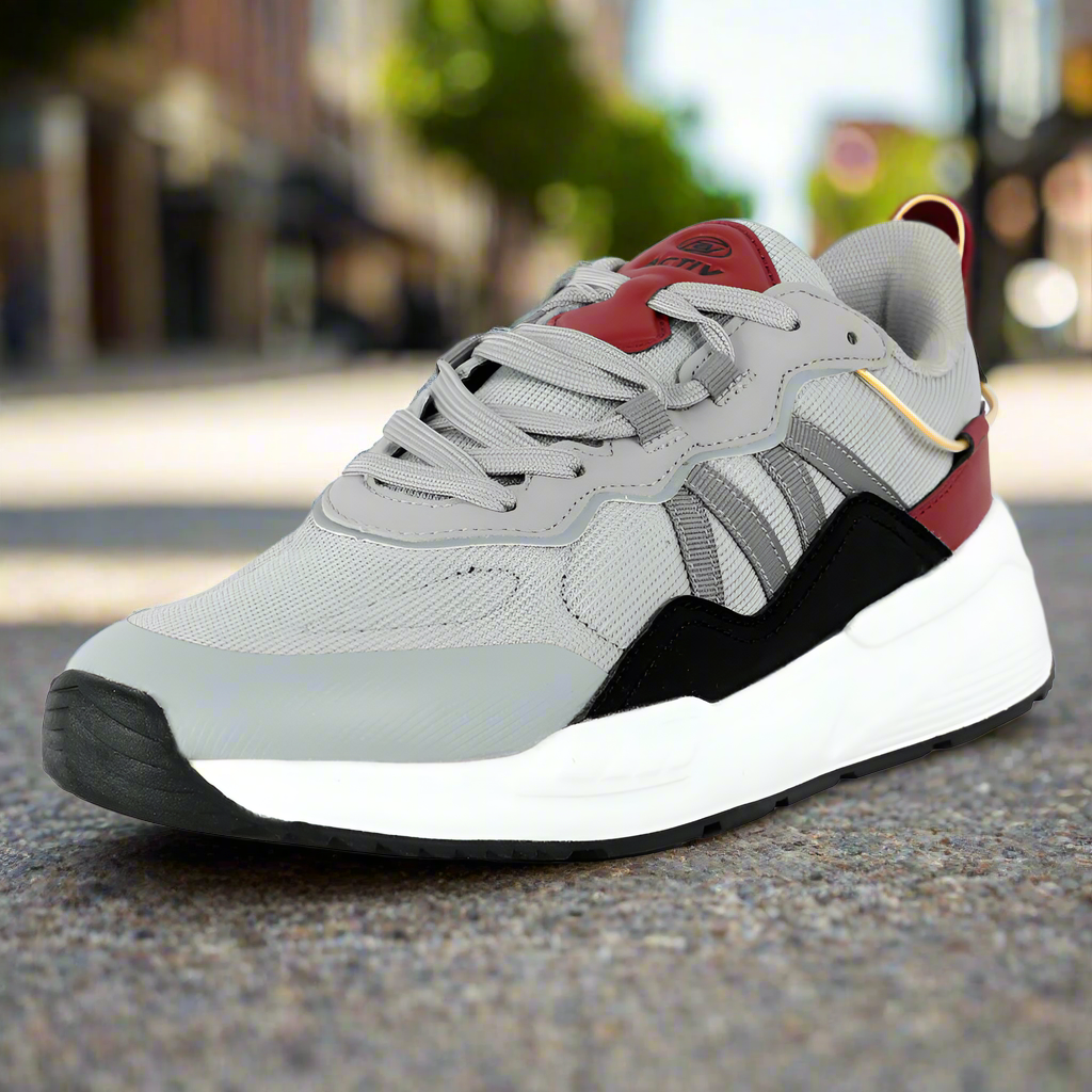 Gray sneaker with red accents