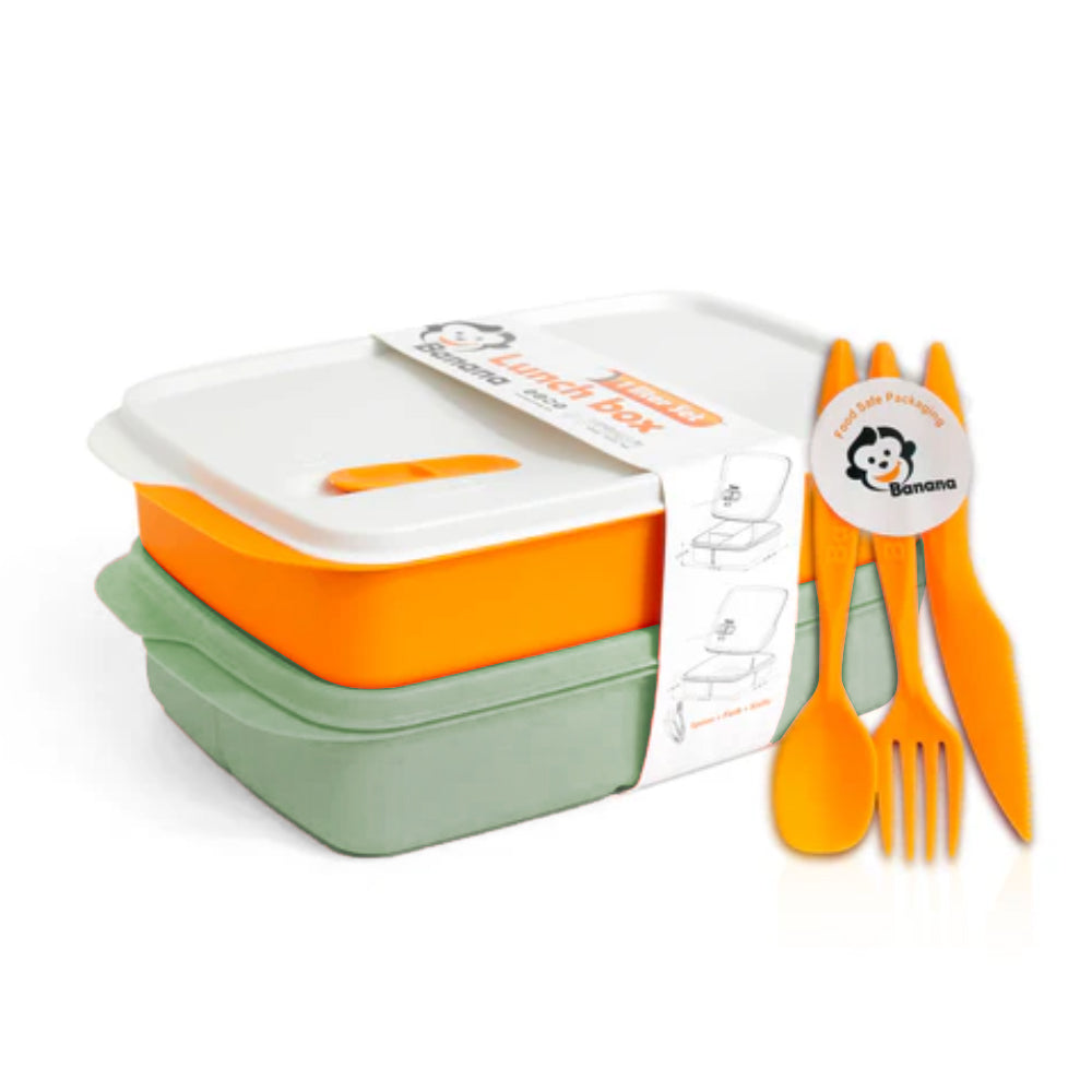 Lunch box set with orange and green containers and matching cutlery on a white background