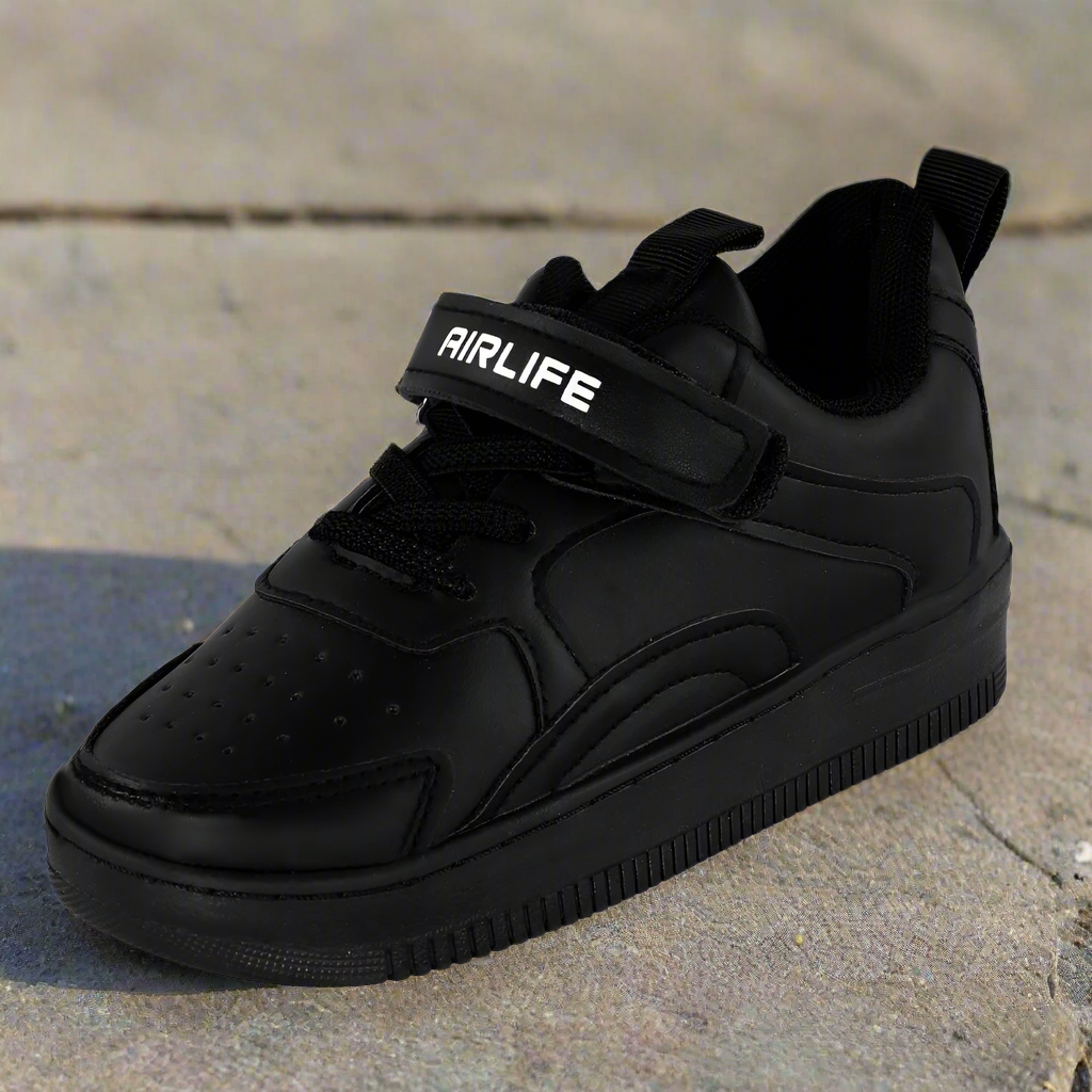 Black sneaker with 'Airlife' branding on a white background