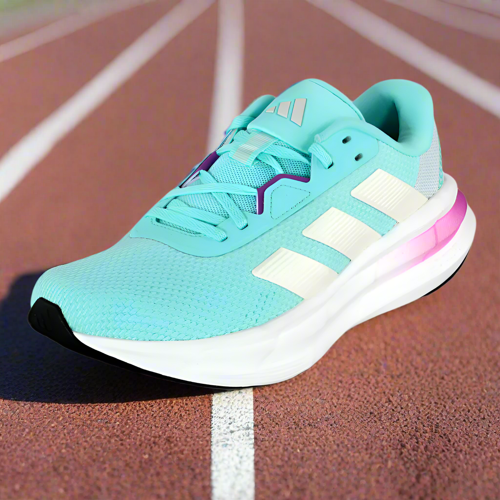 Turquoise running shoe with white stripes on a white background